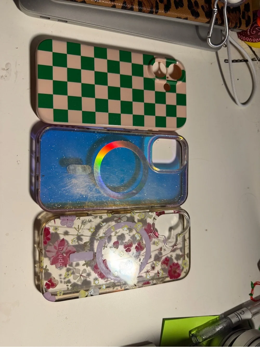 iPhone 16 Phone Case Bundle - Green Checkered, Iridescent Blue, Floral Clear